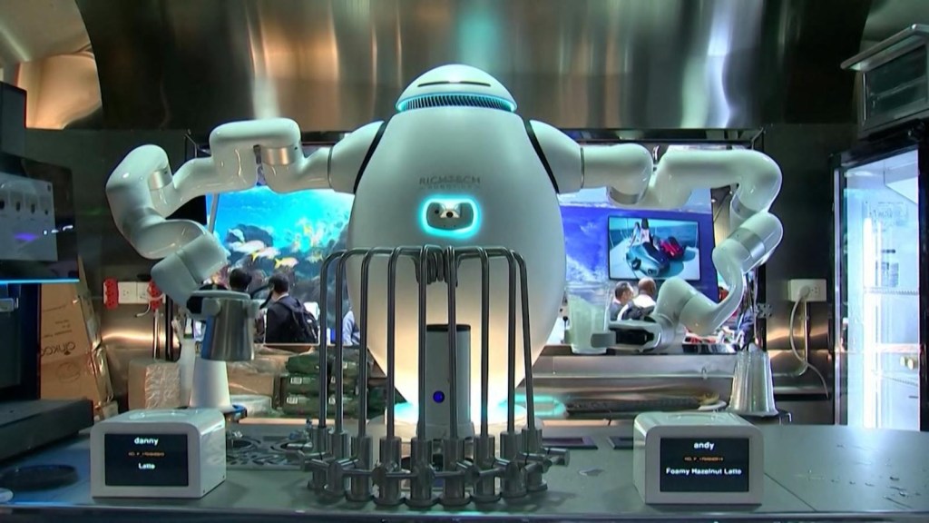 Robot barista prepara cafés en la exposición CES 2024