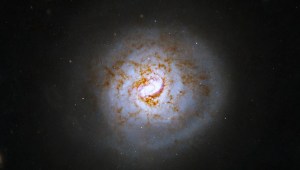 El Telescopio Espacial Hubble descubre galaxia espiralada similar a una pelota de béisbol