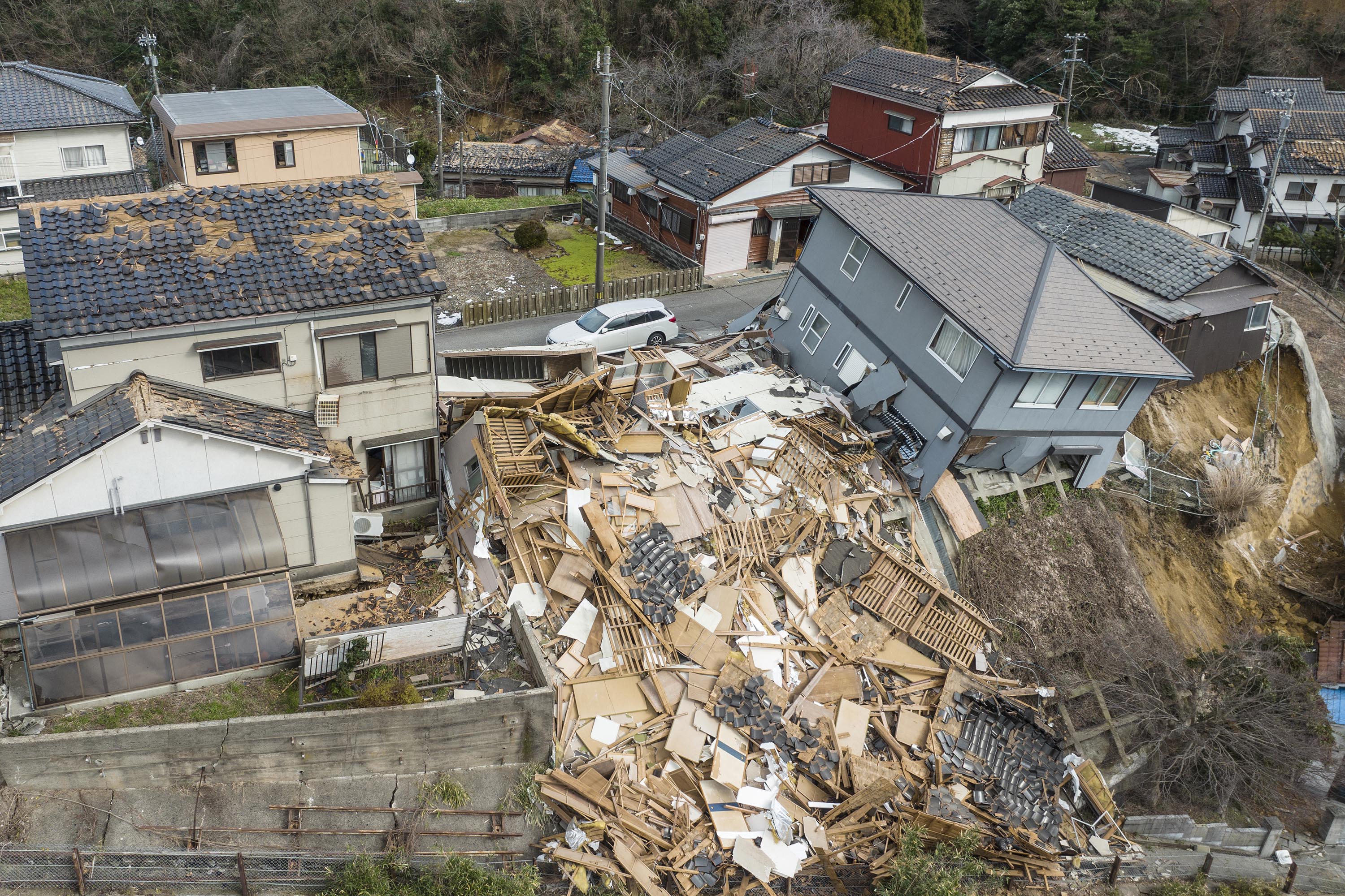 An aerial photo shows destroyed and damaged buildings in Wajima, Ishikawa Prefecture, on January 2, 2024, after a strong earthquake struck western Japan.  (Photo credit: Fred Merry/AFP via Getty Images)