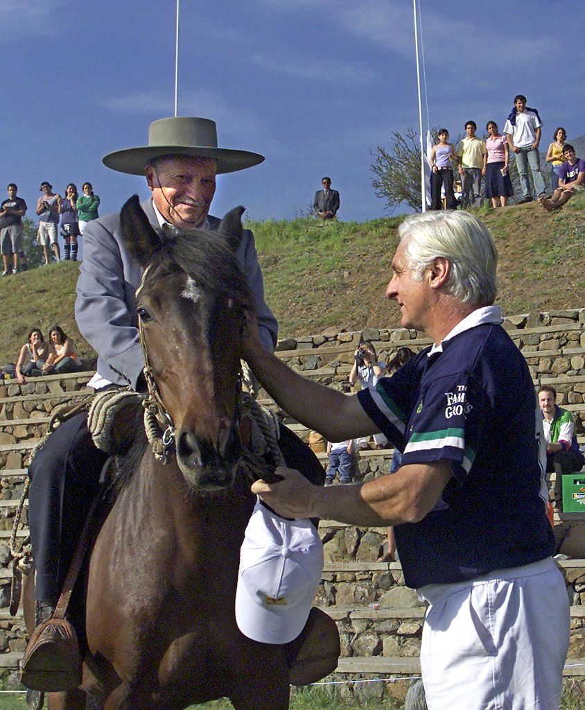 Within the framework of the 30th anniversary of the Andes tragedy of October 12, 2002, Sergio Catalan rides on a horse and Roberto Canessa is next to him.  (Credit: Julio Castro/AFP via Getty Images)