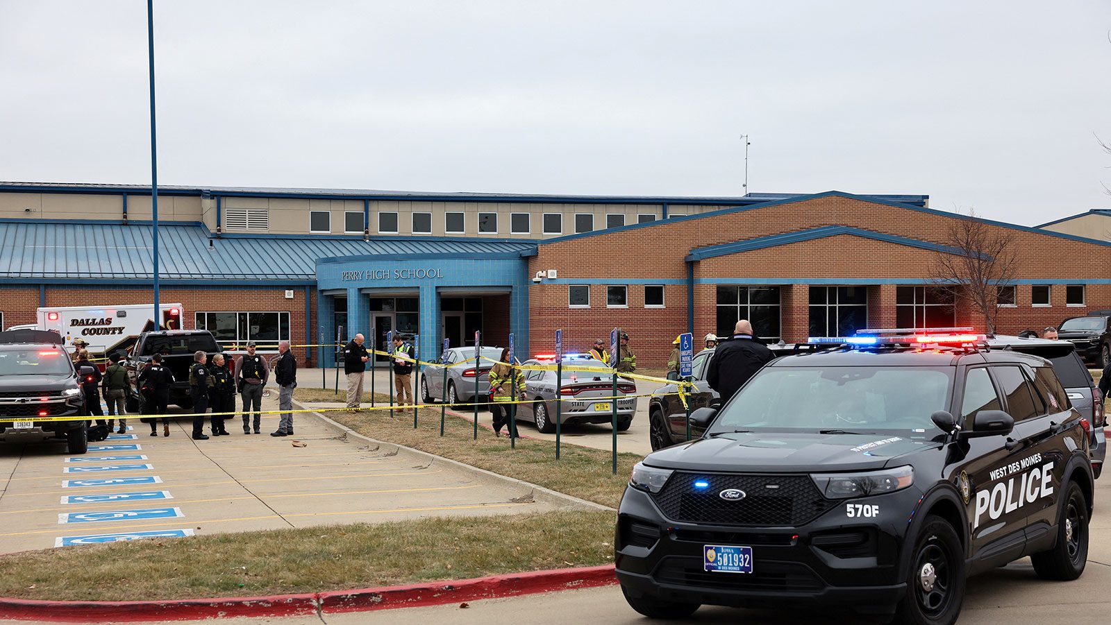 Police respond to a shooting at a high school in Iowa