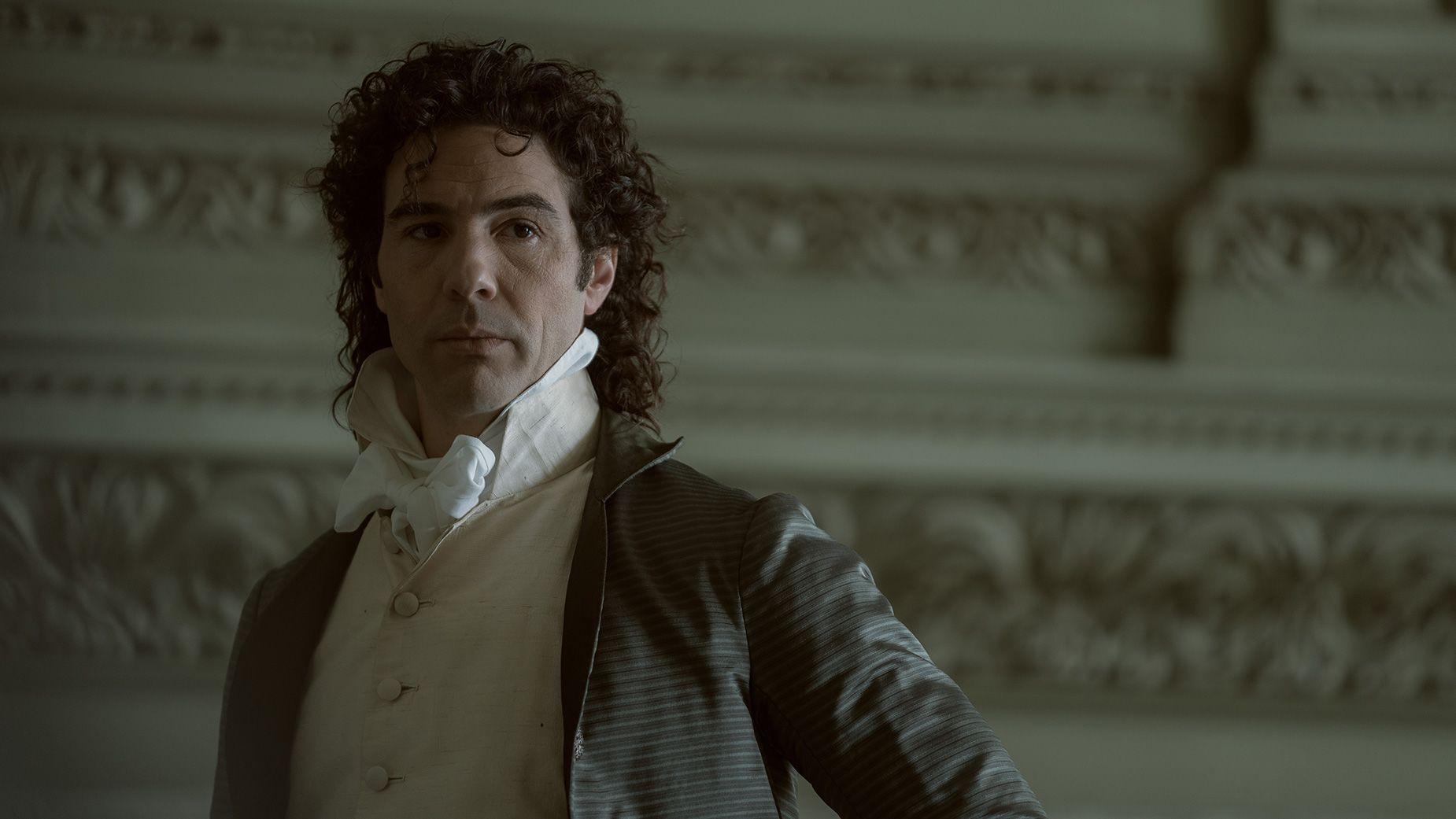 Paul Barras (played by Tahar Rahim) sports a luxurious curly mullet 
