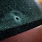 Se muestra un agujero de bala en un automóvil en Lerdo de Tejada, Veracruz, México, el 19 de enero de 2024. (Foto: Victoria Razo/AFP/vía Getty Images).