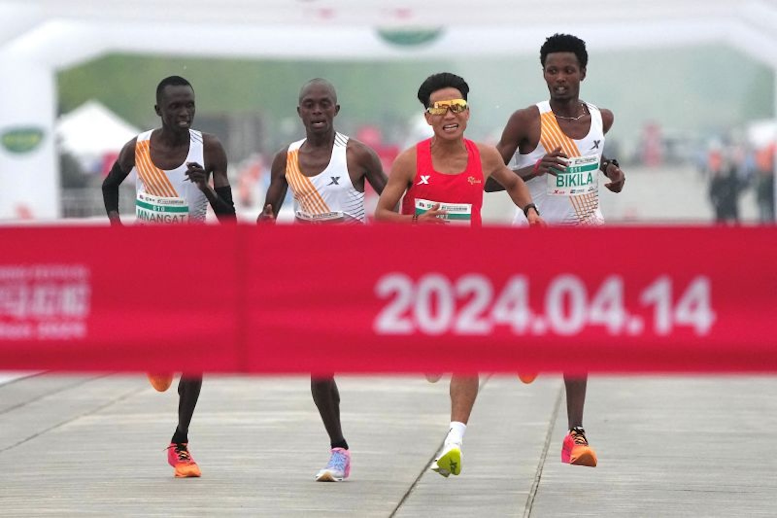 A Chinese runner's victory in the Beijing Half Marathon raises doubts about whether his rivals will let him win.