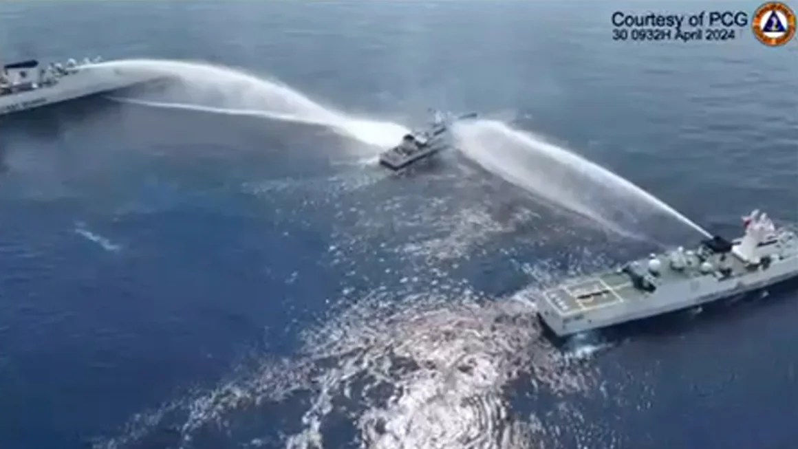 Chinese water cannon damages ship in new South China Sea fire, Philippines says