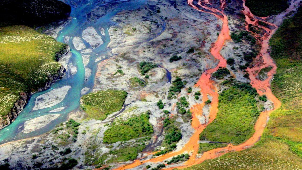 Alaska’s rivers flip orange.  “It’s an unintended consequence of local weather change”